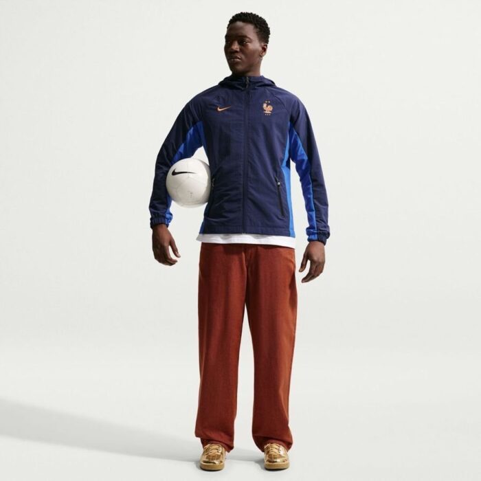 France Training Jacket Dri-FIT AWF Woven World Cup 2026 - Blackened Blue/Game Royal/Metallic Copper